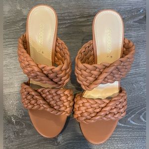 slip-on sandal with woven straps and a stiletto heel 7.5